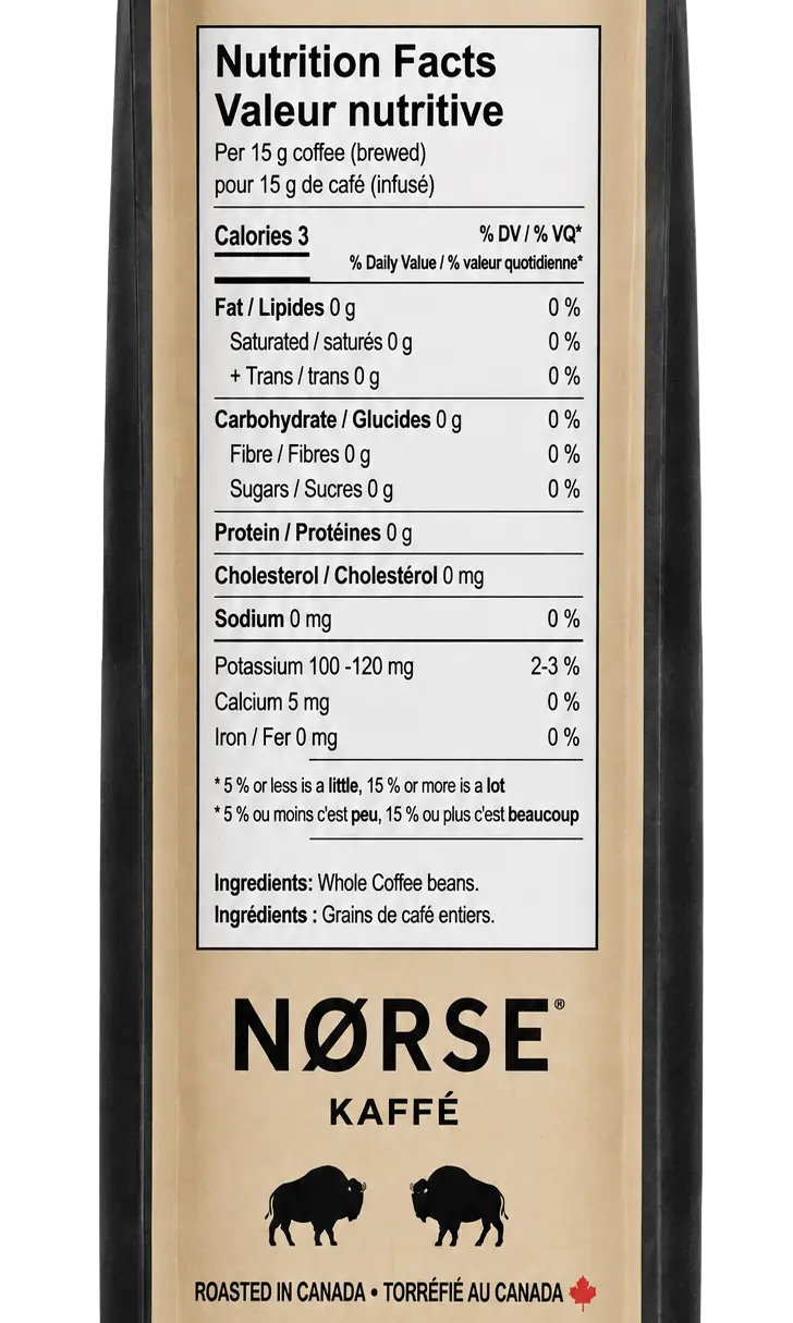 The back of the Primaeval Blend bag: Nutrition Facts per 15 g of brewed coffee — 3 calories; 0 g fat, carbohydrate and protein; 0 mg cholesterol and sodium; potassium 100–120 mg; calcium 5 mg. Ingredients: whole coffee beans. Below it the NORSE Kaffé mark, two bison, and Roasted in Canada.
